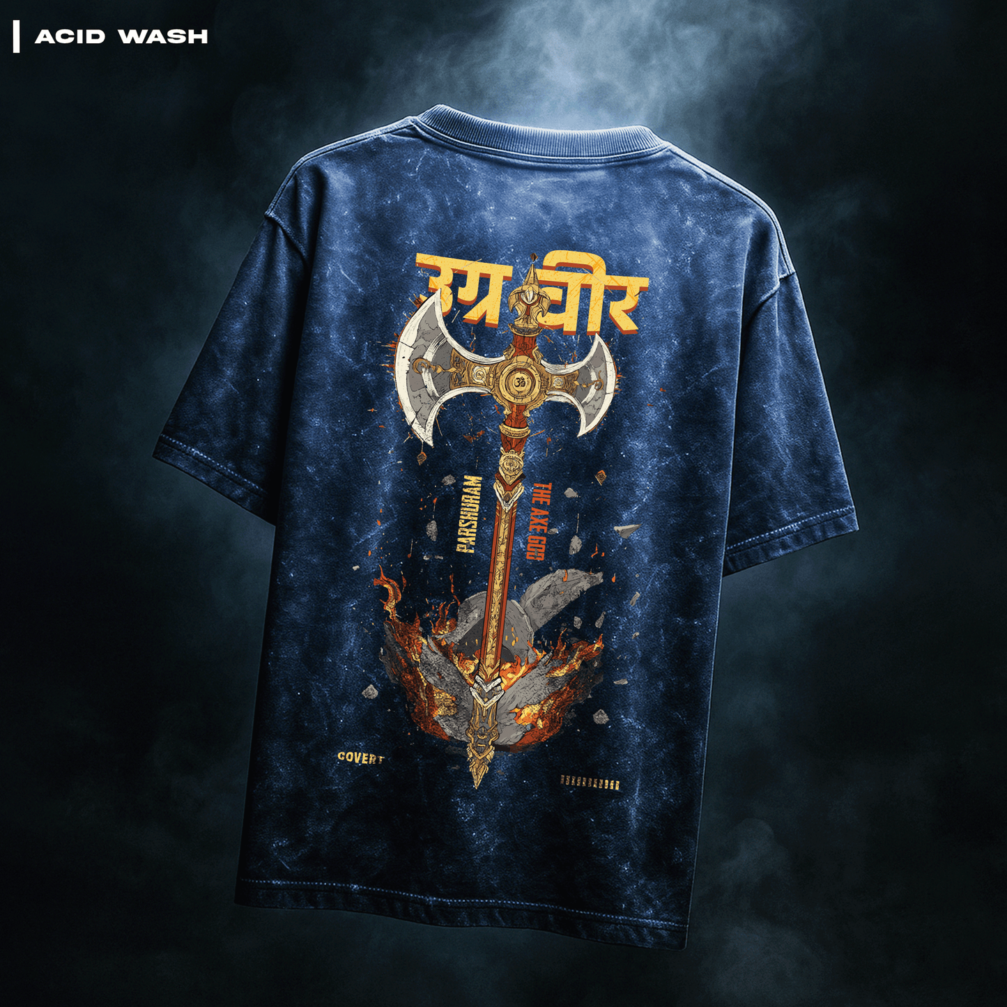 Blue acid-wash t-shirt with a graphic design on the back against a dark background. Parashu: The Mighty Axe T-shirt Covert