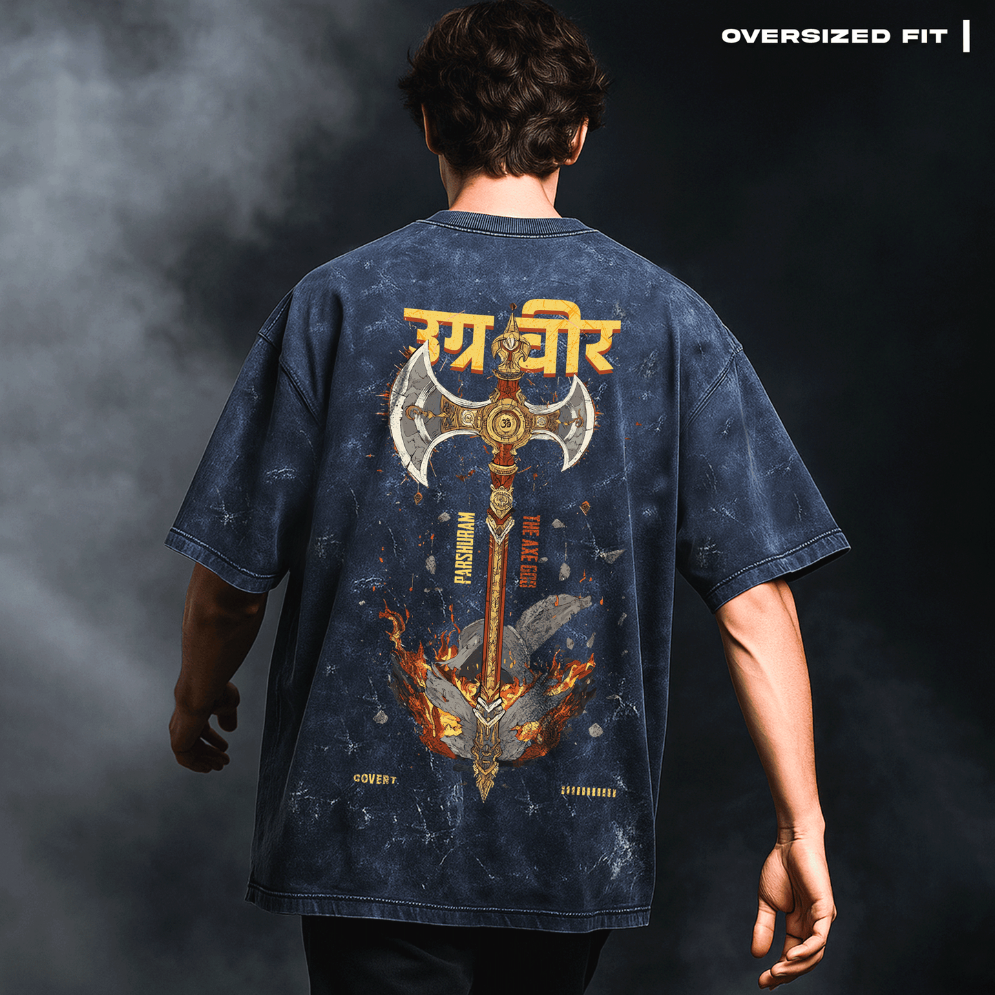 Person wearing an oversized t-shirt with a detailed design on the back against a dark background. Parashu: The Mighty Axe T-shirt