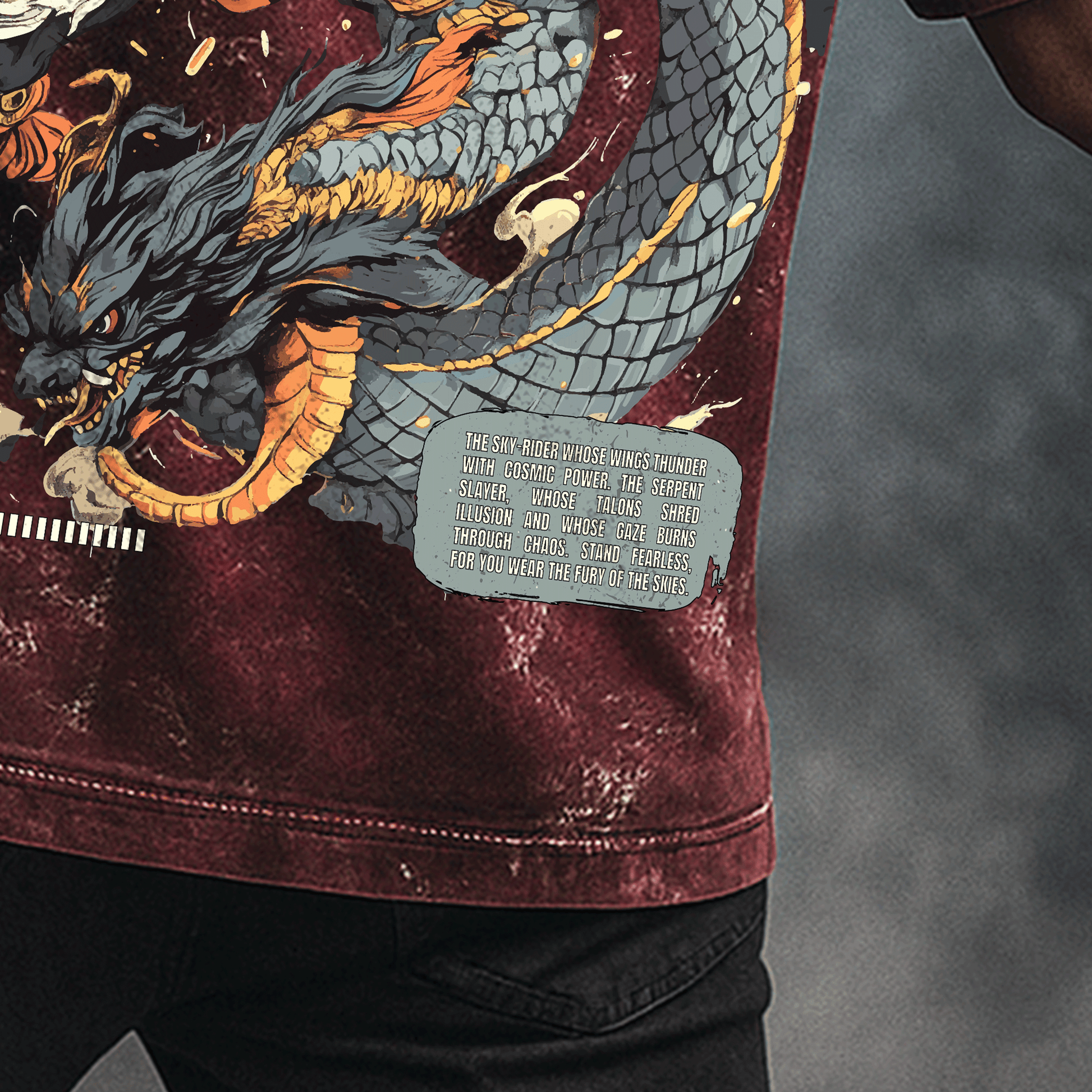 Man wearing Garuda: The Serpent Slayer T-shirt with a dragon and eagle design on the back against a dark background.