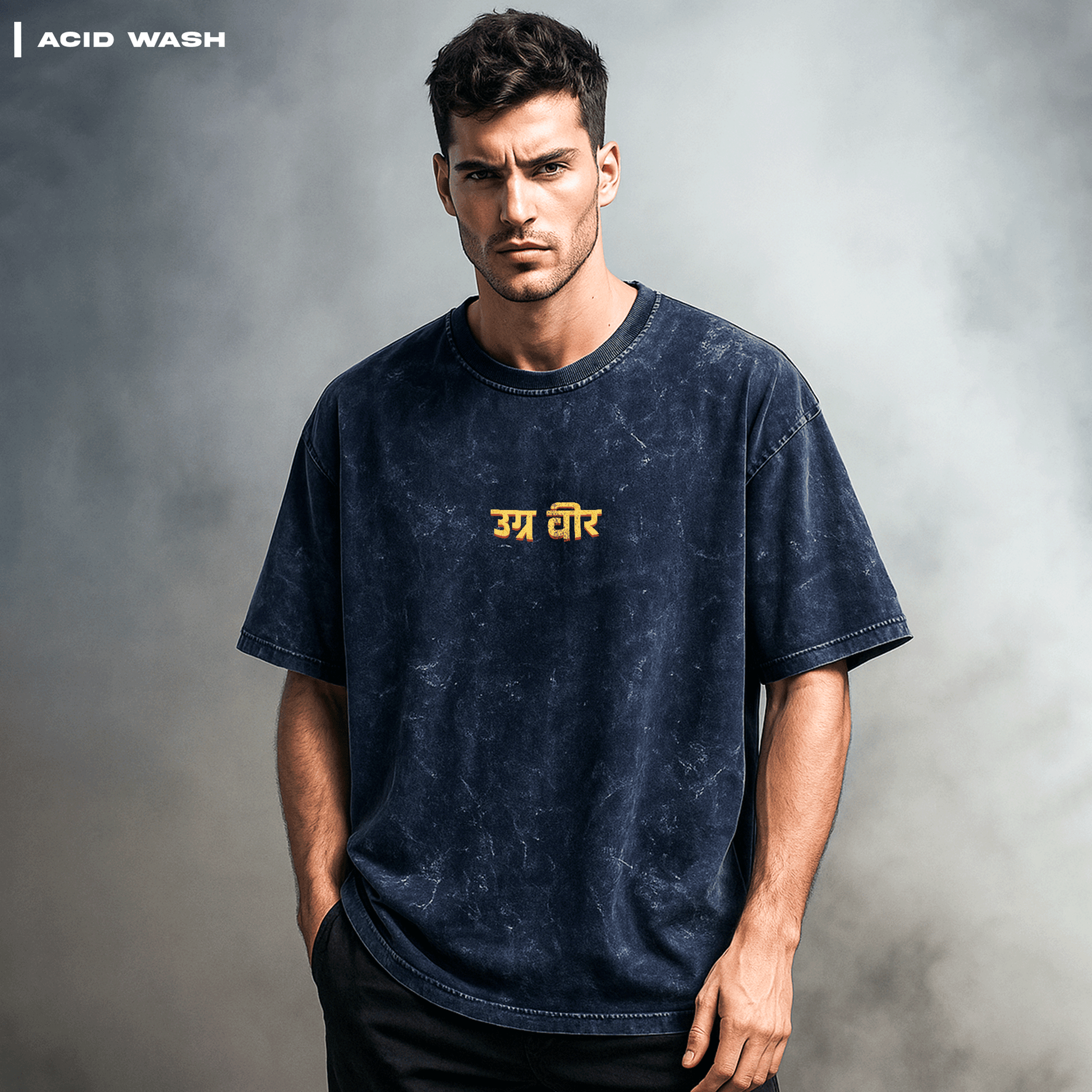 Man wearing a dark acid-wash t-shirt with yellow text against a gray background. Parashu: The Mighty Axe T-shirt Covert