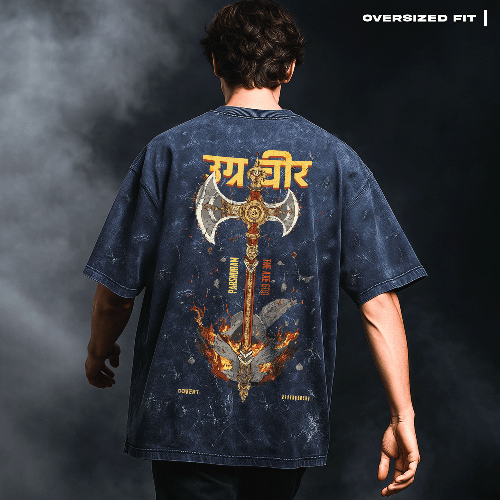 Person wearing an oversized t-shirt with a detailed design on the back against a dark background. Parashu: The Mighty Axe T-shirt