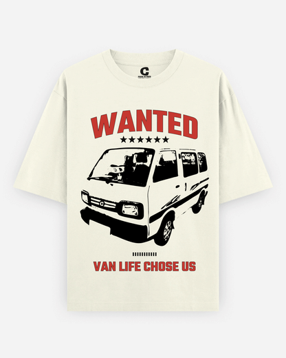 An off-white The Wanted Van T-shirt by Covert with a graphic print featuring a black and white van and red text reading 'WANTED' and 'VAN LIFE CHOSE US' on a light gray background.